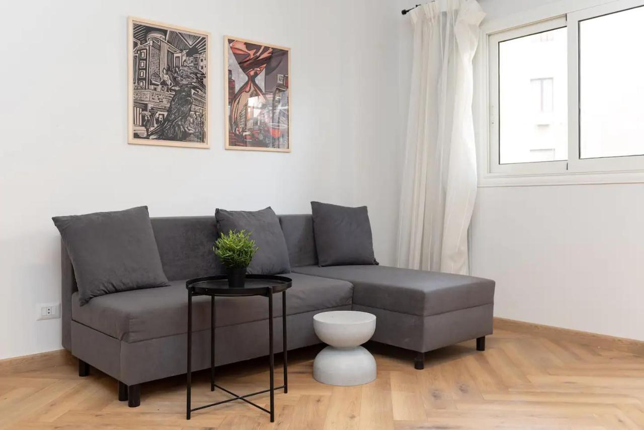 Grey L Downtown Ouzonian House *